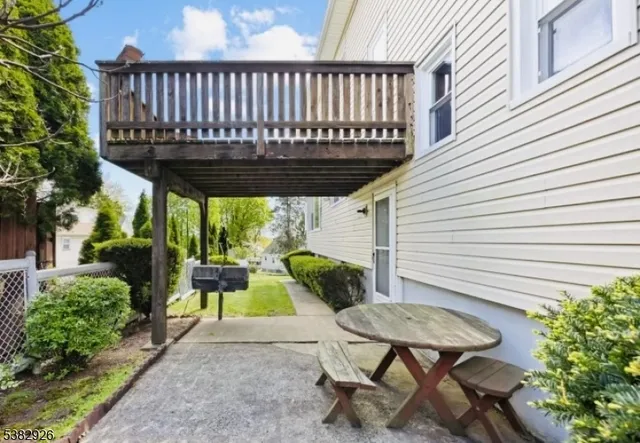a view of a table and chairs in patio