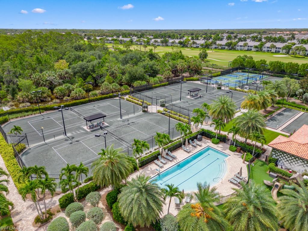 16371 Viansa Way, Unit 201 Naples, FL 34110 - Photo 39 of 42 a view of a swimming pool and outdoor space