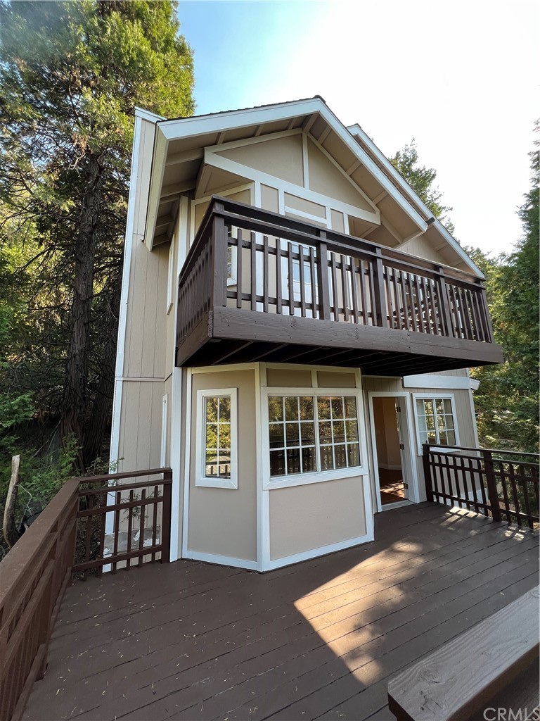 23783 Bowl Road Crestline, CA 92325 - Photo 1 of 1 a front view of a house with yard