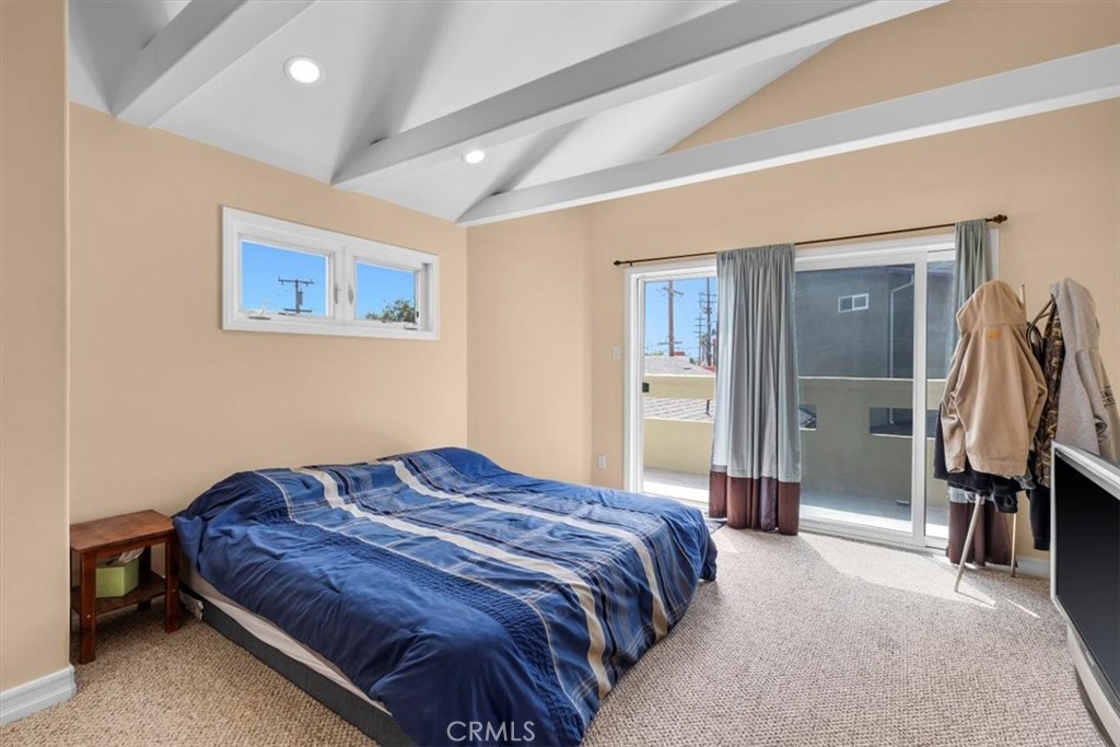 528 East 238th Place Carson, CA 90745 - Photo 18 of 75 a bedroom with a bed and a walk in closet