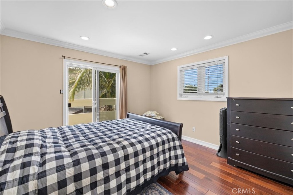 528 East 238th Place Carson, CA 90745 - Photo 23 of 75 a bedroom with a bed and a window