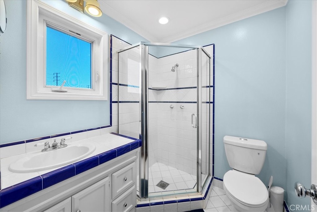 528 East 238th Place Carson, CA 90745 - Photo 24 of 75 a bathroom with a toilet sink and shower