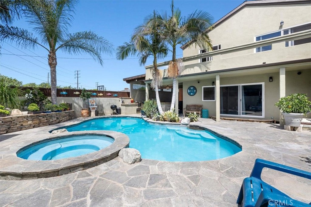 528 East 238th Place Carson, CA 90745 - Photo 30 of 75 a view of a house with swimming pool and sitting area