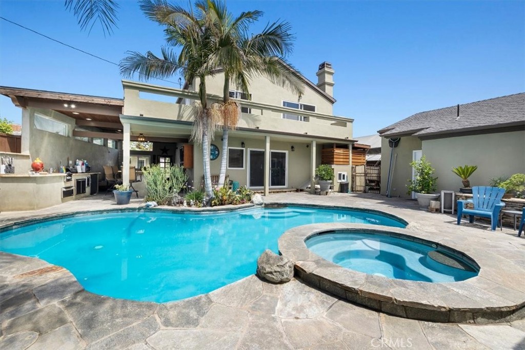 528 East 238th Place Carson, CA 90745 - Photo 31 of 75 a view of a house with swimming pool and porch
