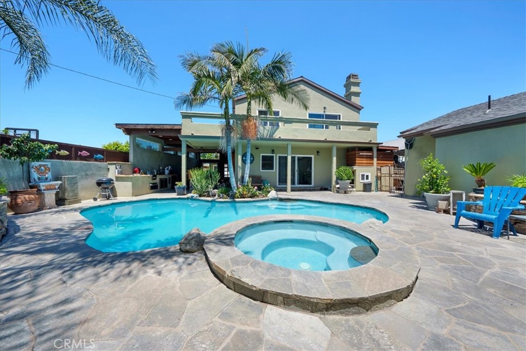 528 East 238th Place Carson, CA 90745 - Photo 32 of 75 a view of a house with swimming pool and sitting area