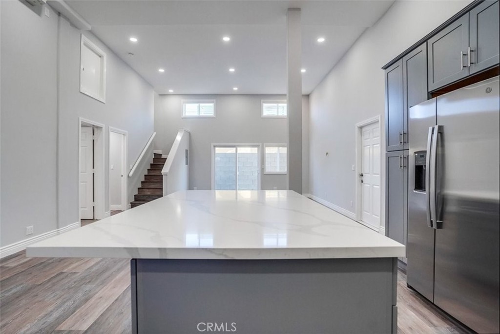 528 East 238th Place Carson, CA 90745 - Photo 42 of 75 a kitchen with stainless steel appliances a refrigerator and a counter space