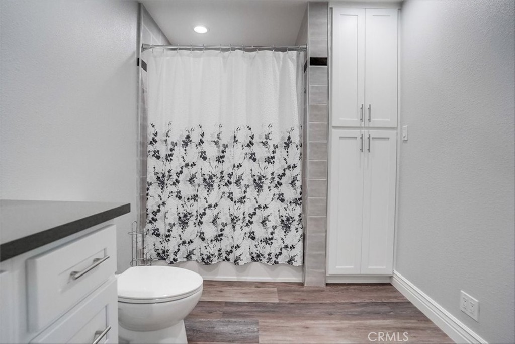 528 East 238th Place Carson, CA 90745 - Photo 46 of 75 a bathroom with a toilet and a shower