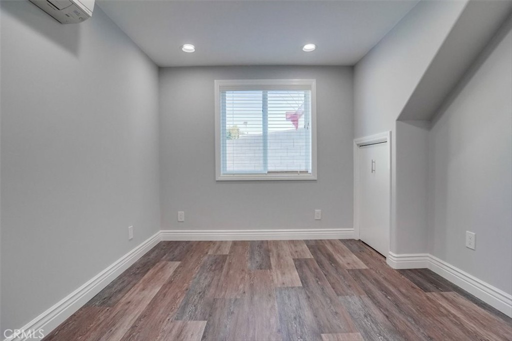 528 East 238th Place Carson, CA 90745 - Photo 48 of 75 wooden floor in an empty room with a window