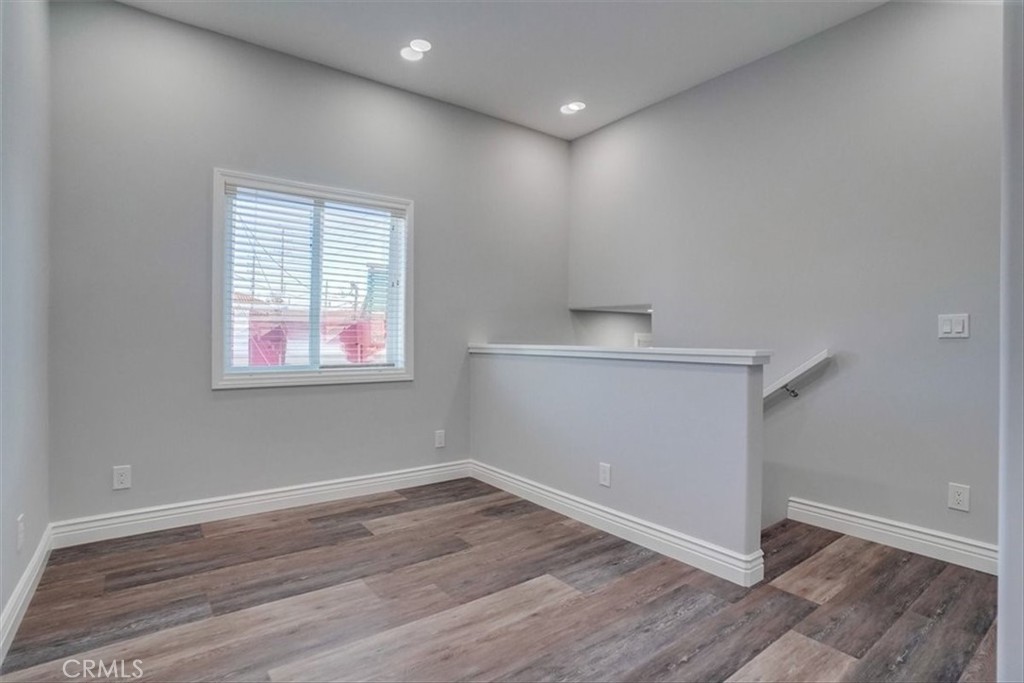 528 East 238th Place Carson, CA 90745 - Photo 52 of 75 a view of empty room with wooden floor and fan