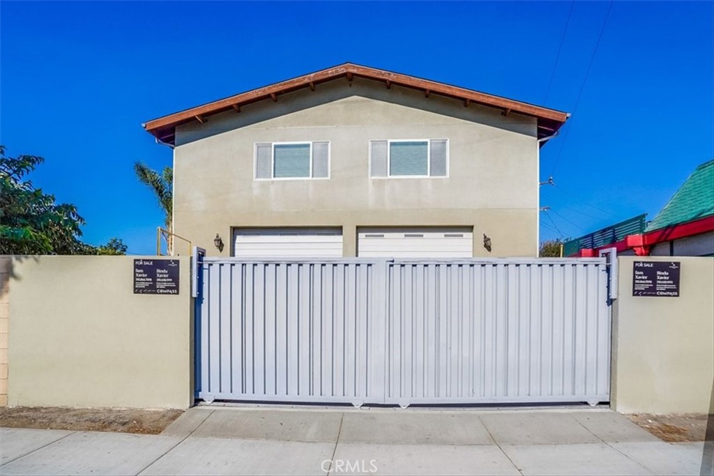 528 East 238th Place Carson, CA 90745 - Photo 59 of 75 a view of a house with wooden fence
