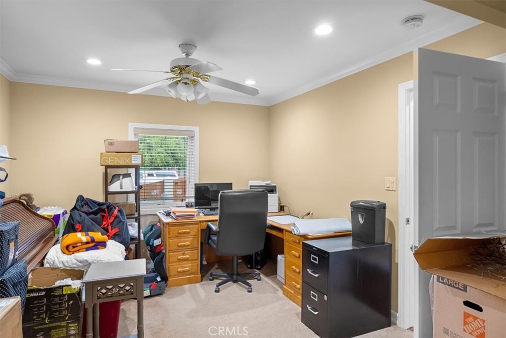528 East 238th Place Carson, CA 90745 - Photo 7 of 75 a view of a workspace with furniture and a window