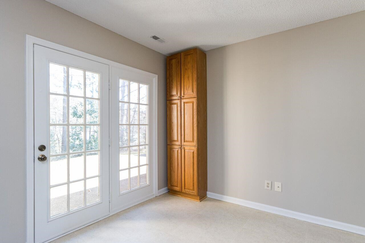 718 Red Forest Trail Raleigh, NC 27615 - Photo 13 of 30 Breakfast Area with door opening to the private backyard and patio. Breakfast Area