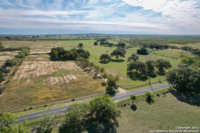 10671 Briggs Road Atascosa, TX 78002 - Photo 28 of 38 a view of a lake with a mountain