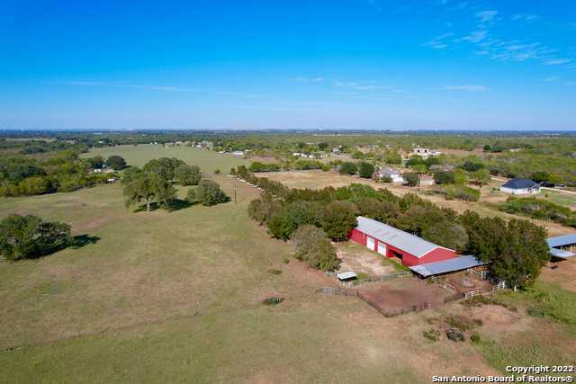 10671 Briggs Road Atascosa, TX 78002 - Photo 31 of 38 an aerial view of a houses with outdoor space