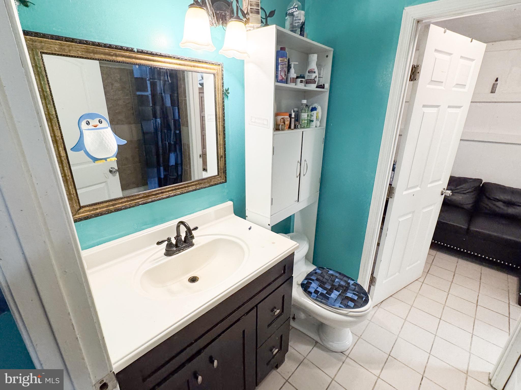 4512 Woodpecker Road Seaford, DE 19973 - Photo 20 of 32 Charming bathroom with vibrant hues.