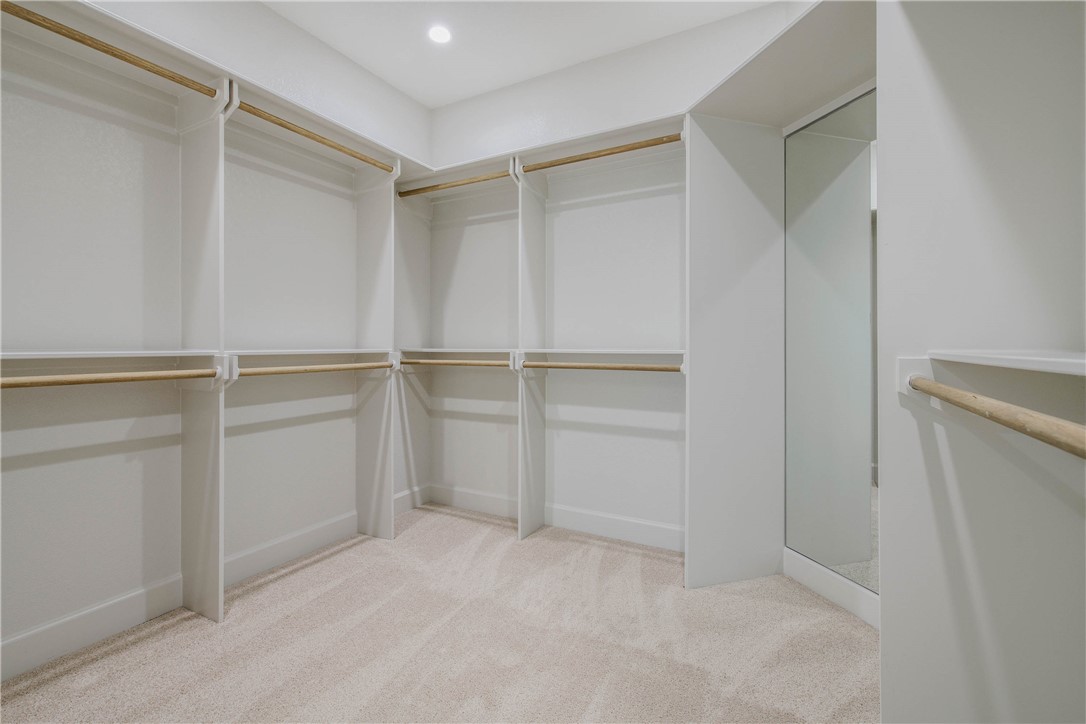 1652 Frontera Ranch Boulevard College Station, TX 77845 - Photo 17 of 29 a view of an empty walk in closet