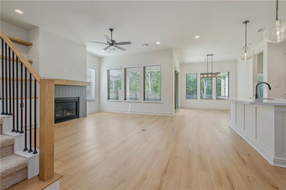 1652 Frontera Ranch Boulevard College Station, TX 77845 - Photo 5 of 29 a view of an empty room with window and wooden floor