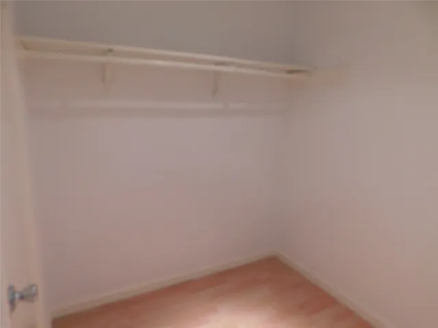 a view of small space with racks on the wall