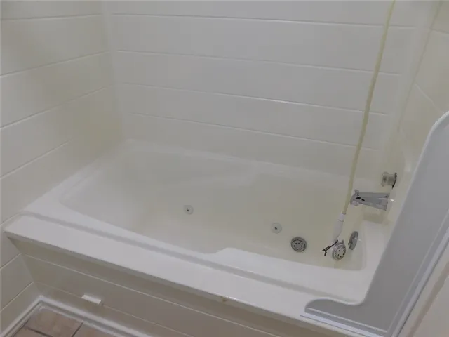 a bathroom with a bathtub