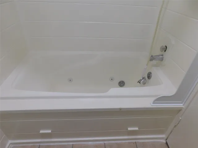 a bathroom with bathtub