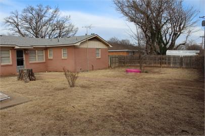 4409 27th Street Lubbock, TX 79410 - Photo 18 of 18 a view of backyard of house