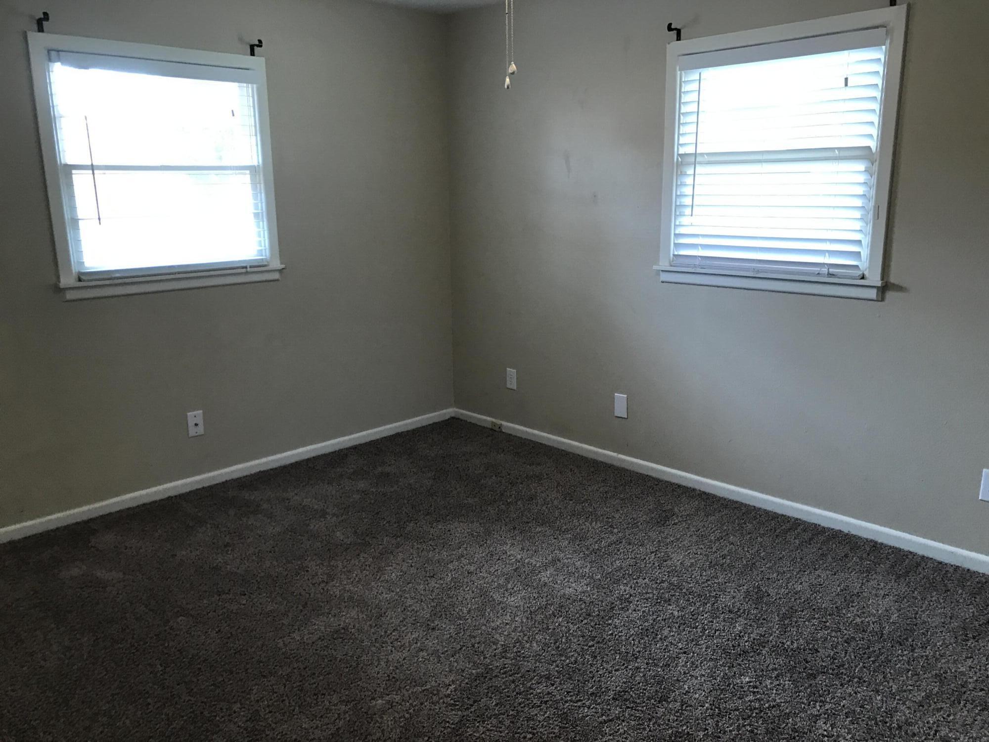 4409 27th Street Lubbock, TX 79410 - Photo 8 of 18 an empty room with a window