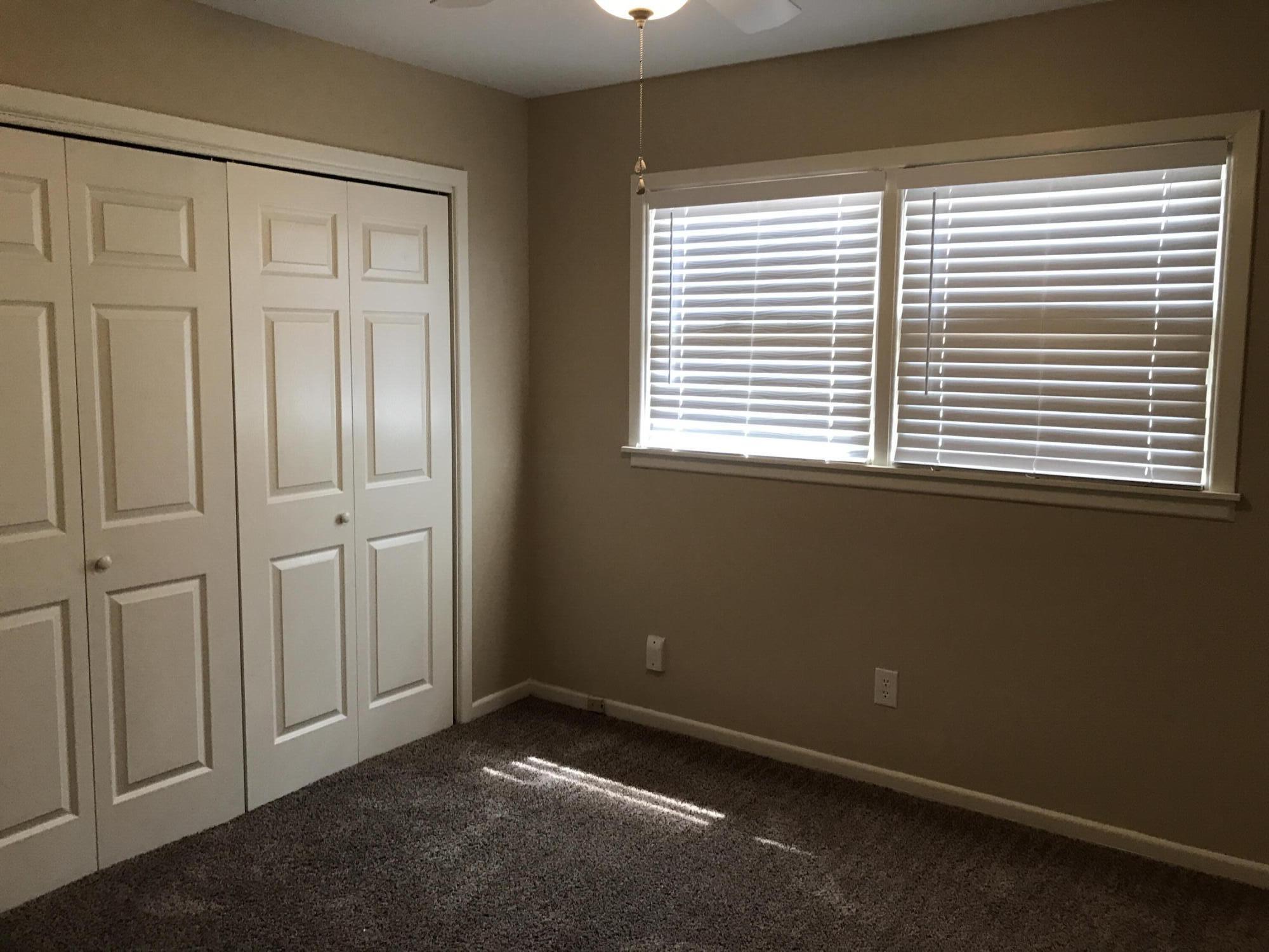 4409 27th Street Lubbock, TX 79410 - Photo 10 of 18 an empty room with a window