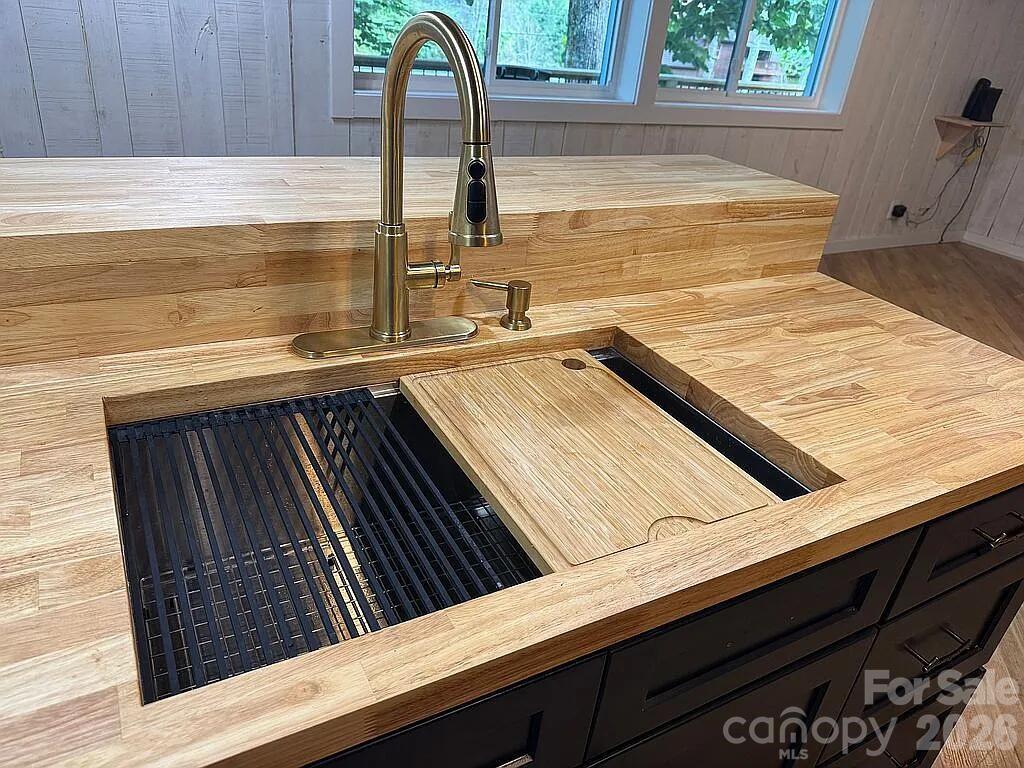 101 Mountain Farm Road Burnsville, NC 28714 - Photo 18 of 32 a close view of kitchen sink stove and oven