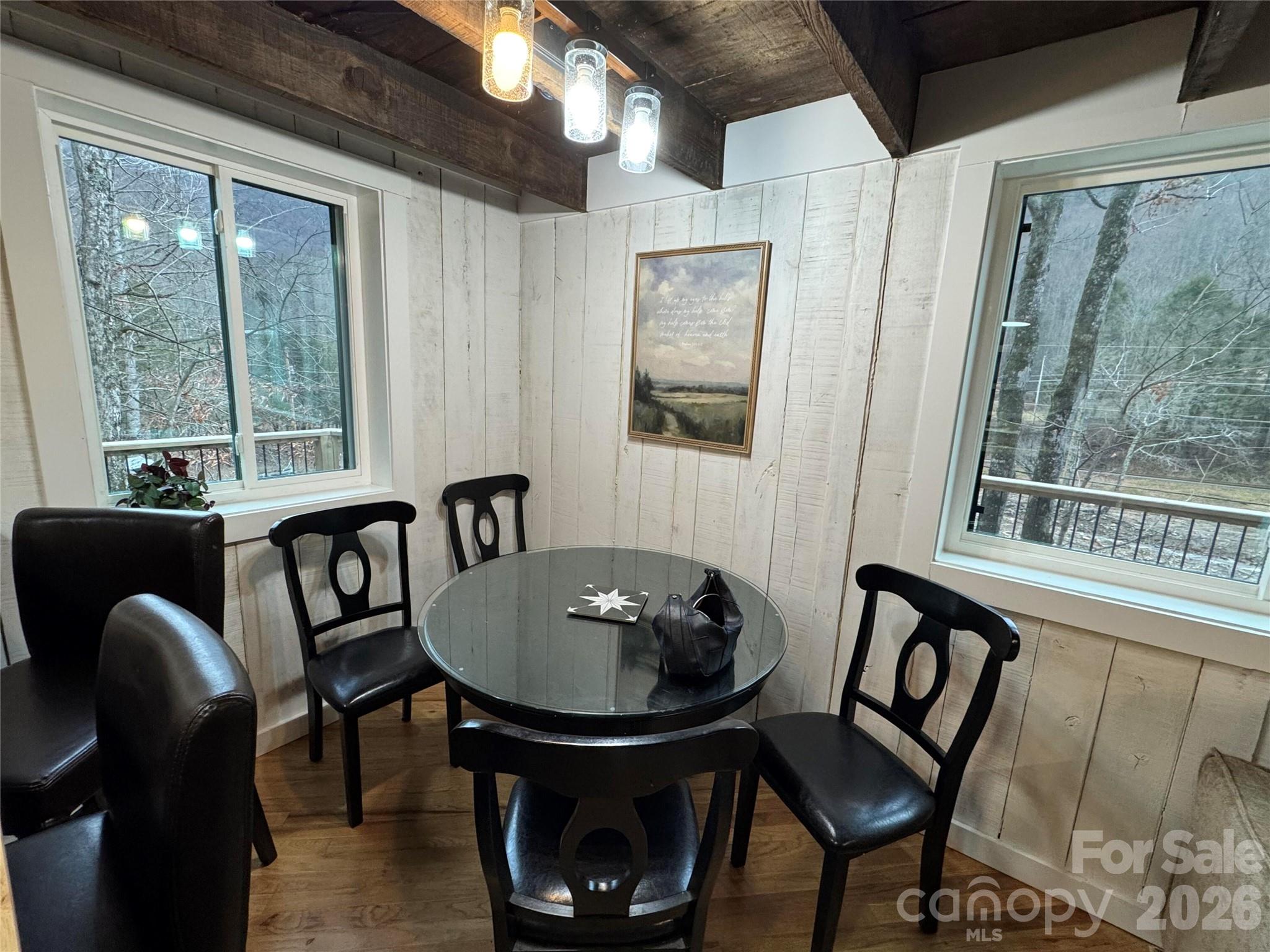 101 Mountain Farm Road Burnsville, NC 28714 - Photo 20 of 32 a dining room with furniture and window