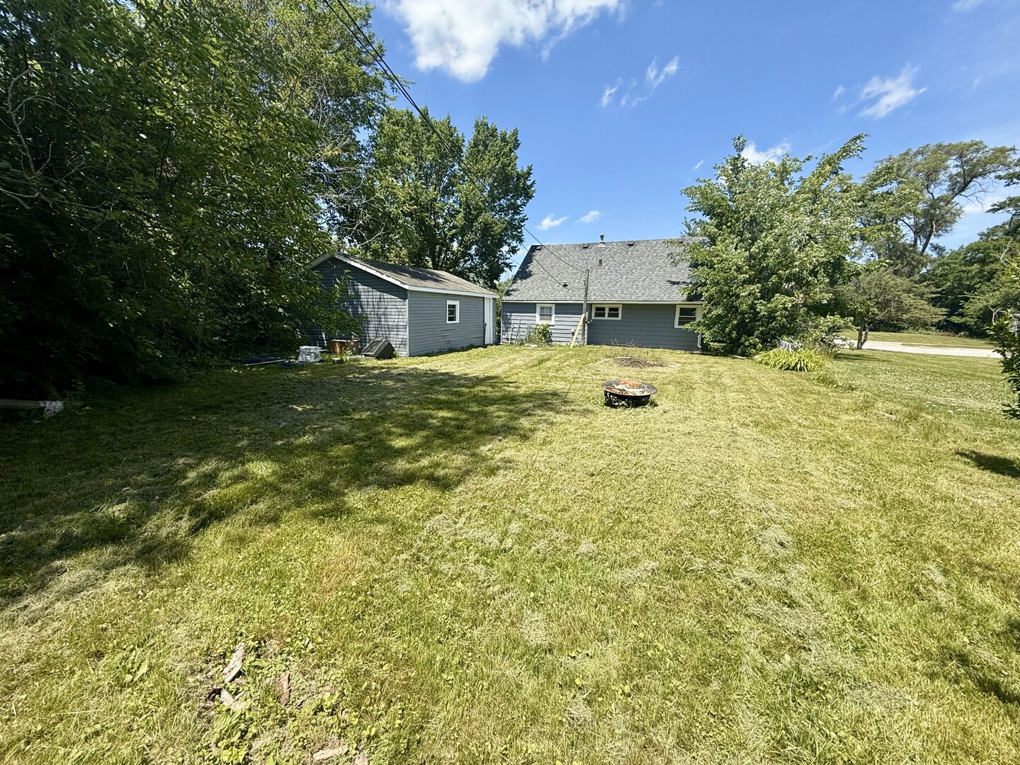 263 Allegheny Street Park Forest, IL 60466 - Photo 14 of 15 a view of a house with pool and a yard