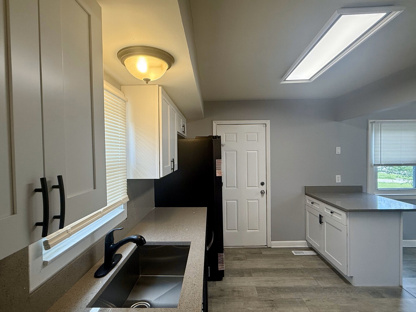 263 Allegheny Street Park Forest, IL 60466 - Photo 6 of 15 a bathroom with a sink and a mirror