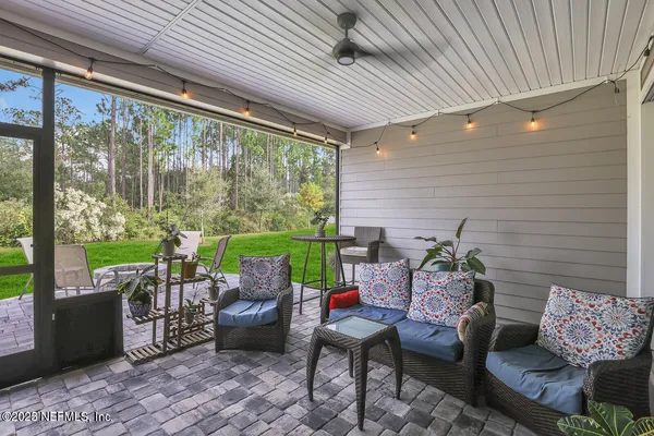 a outdoor living space with furniture and garden view