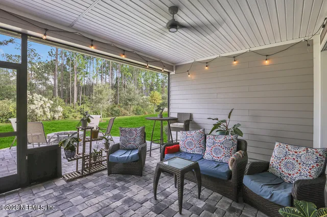 a outdoor living space with furniture and garden view