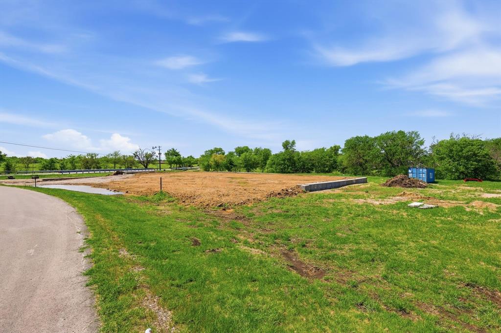 501 Rising Star Lane Sanger, TX 76266 - Photo 3 of 17 a view of a lake with outdoor space