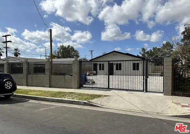 a view of a car in front of a house
