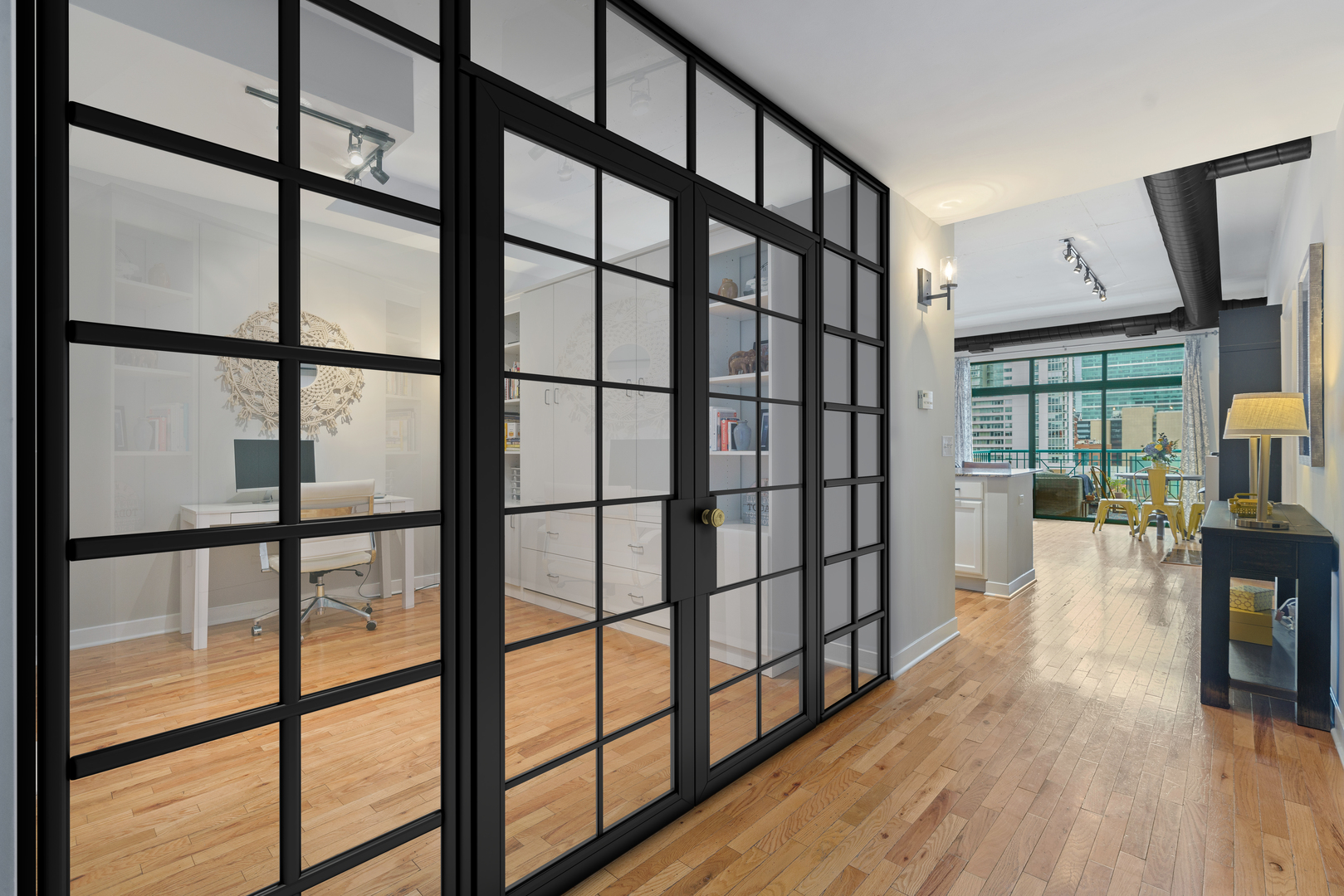 910 West Madison Street, Unit 807 Chicago, IL 60607 - Photo 16 of 21 a view of staircase with wooden floor and floor to ceiling window