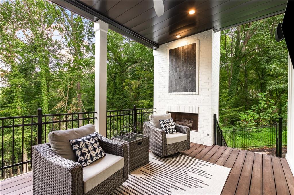 306 Pinecrest Road Northeast Atlanta, GA 30342 - Photo 23 of 67 a outdoor living space with furniture and garden view