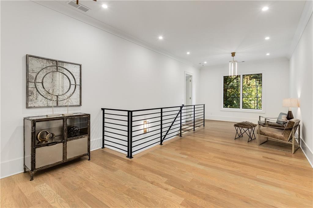 306 Pinecrest Road Northeast Atlanta, GA 30342 - Photo 28 of 67 a view of a livingroom with furniture and a fireplace