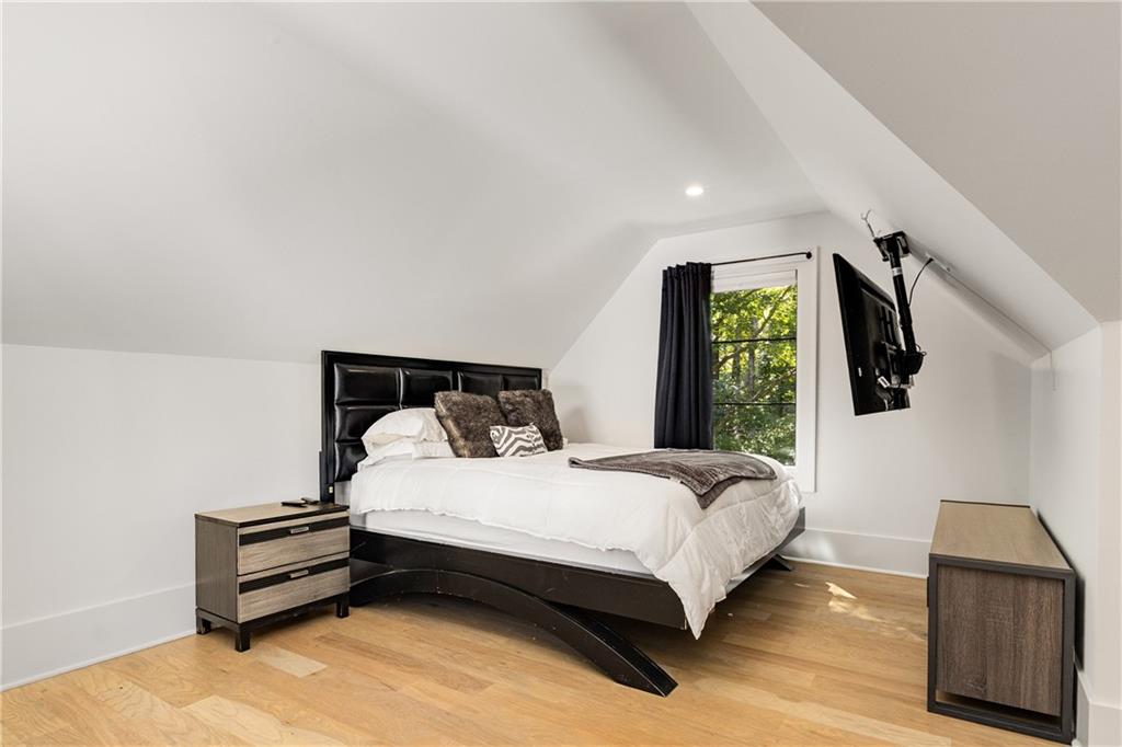 306 Pinecrest Road Northeast Atlanta, GA 30342 - Photo 39 of 67 a bedroom with a bed and a window