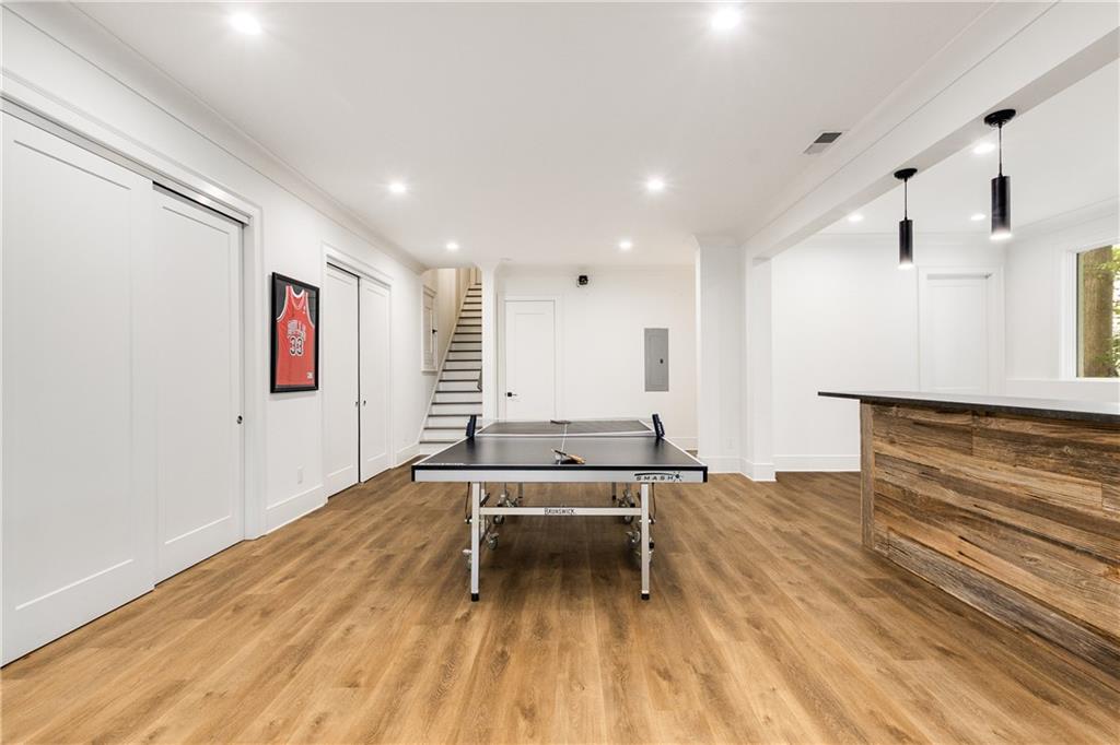 306 Pinecrest Road Northeast Atlanta, GA 30342 - Photo 46 of 67 a living room with stainless steel appliances furniture and a rug