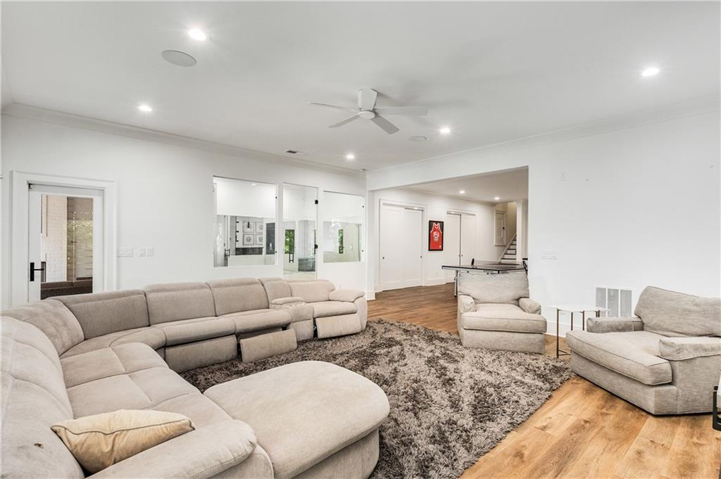 306 Pinecrest Road Northeast Atlanta, GA 30342 - Photo 50 of 67 a living room with furniture and a large window