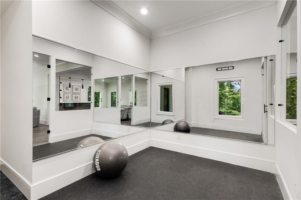 306 Pinecrest Road Northeast Atlanta, GA 30342 - Photo 51 of 67 a living room with furniture and a large window