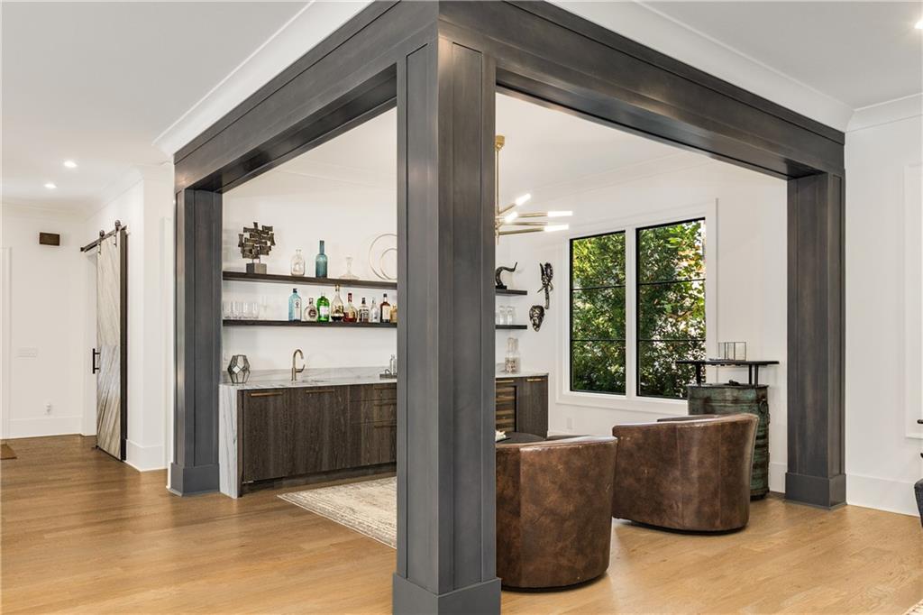 306 Pinecrest Road Northeast Atlanta, GA 30342 - Photo 10 of 67 a living room with furniture and large windows