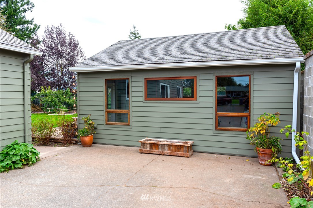 17932 Dunbar Road Mount Vernon, WA 98273 - Photo 38 of 39 a view of a house with a yard and sitting area