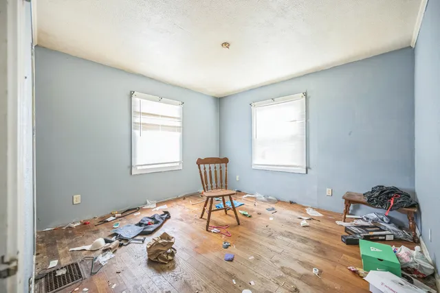 a wooden bench sitting in a room