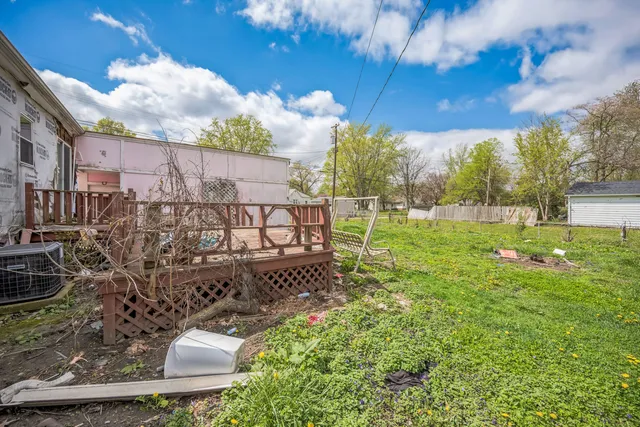 a view of a yard with an outdoor space