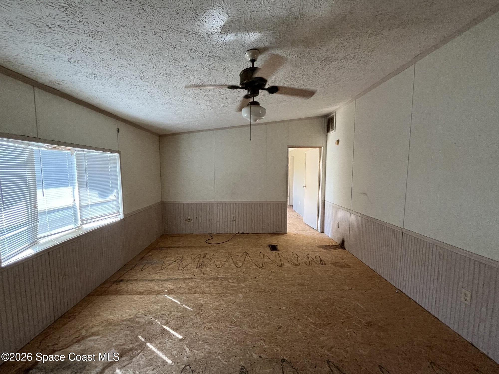 180 Rita Boulevard Melbourne Beach, FL 32951 - Photo 2 of 10 a view of an empty room and window