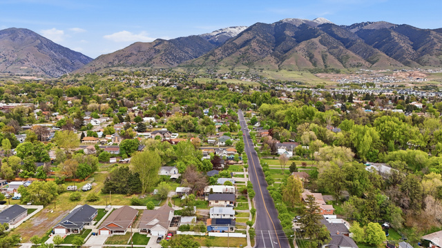 215 East 300 South Logan, UT 84321 - Photo 31 of 32 Aerial view of residential area with mountains