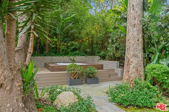 a garden view with a seating space