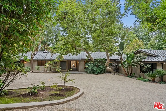 a view of house with outdoor space